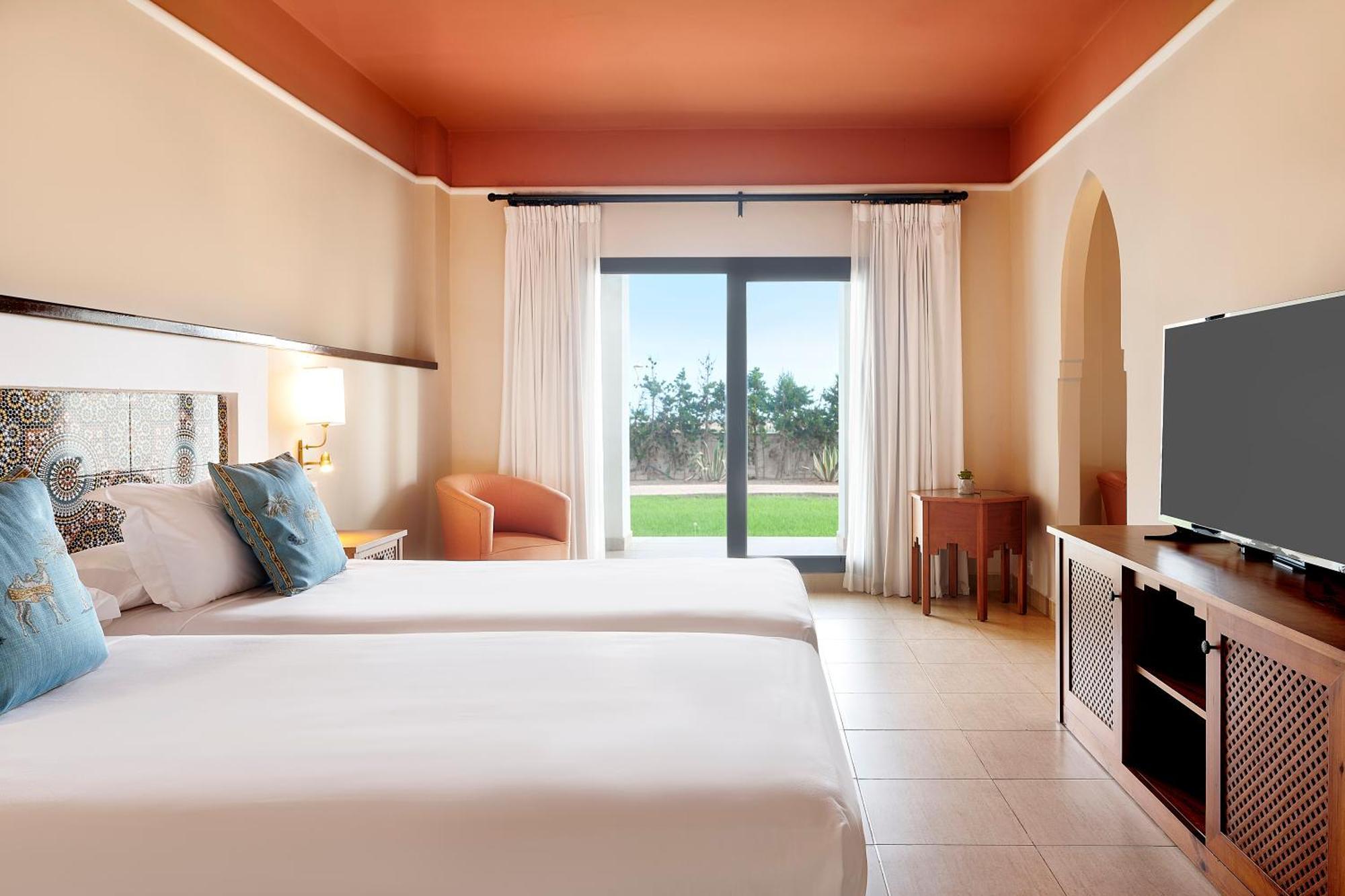 Отель Iberostar Waves Саидия Экстерьер фото A room at the Hilton Garden Inn in Cancun, Mexico
